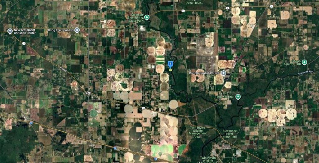 52 Northeast River Ridge Way Lee, FL 32059 - Photo 4 of 6 a view of a tree