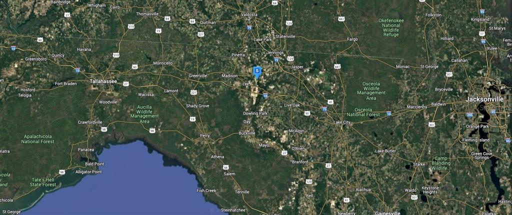 52 Northeast River Ridge Way Lee, FL 32059 - Photo 6 of 6 a view of a house with a yard