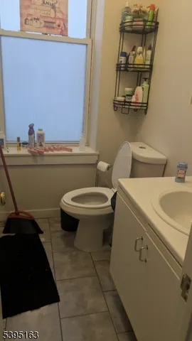 a bathroom with a toilet and a sink