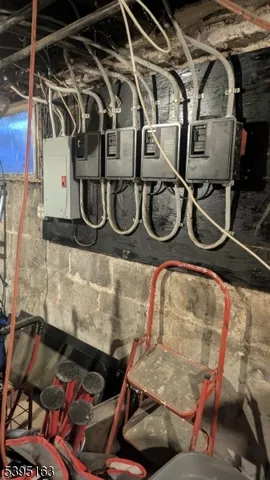 a utility room with multiple dryer and washer