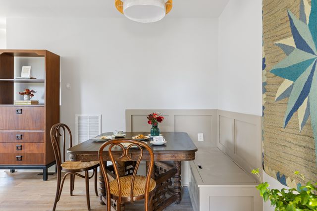 a view of a workspace with furniture