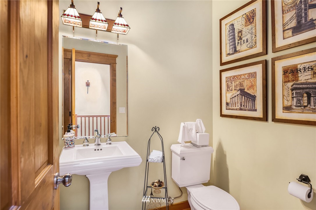 9203 Park Road Edmonds, WA 98020 - Photo 27 of 40 a bathroom with a toilet sink and mirror