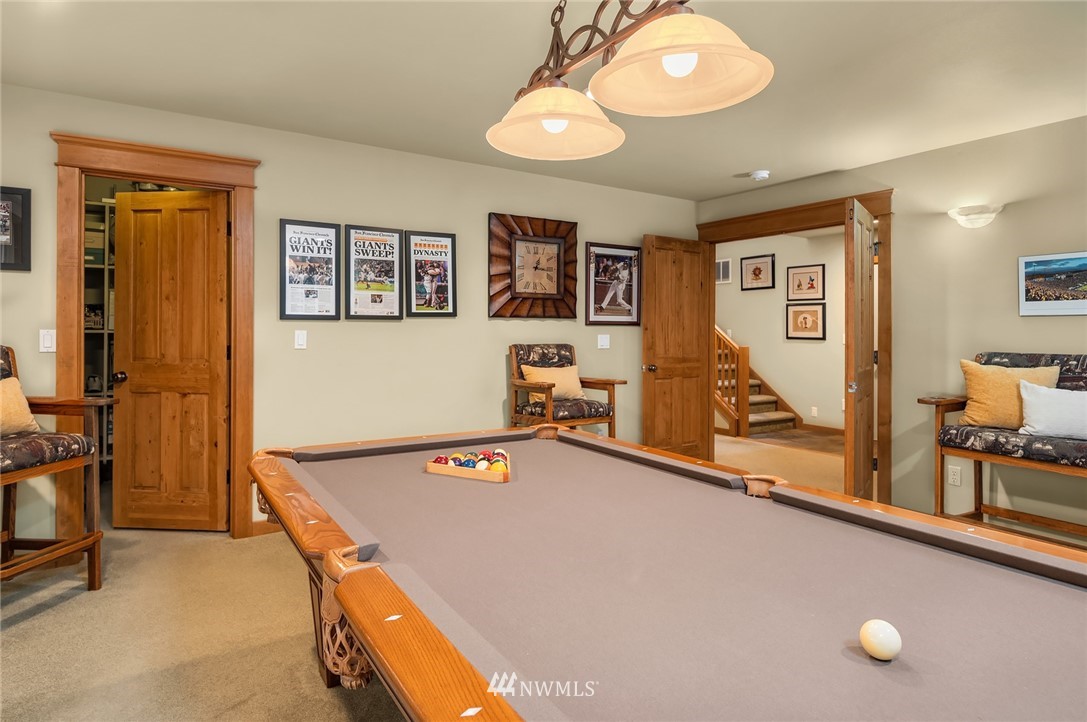 9203 Park Road Edmonds, WA 98020 - Photo 29 of 40 a room with gym equipment and a large window