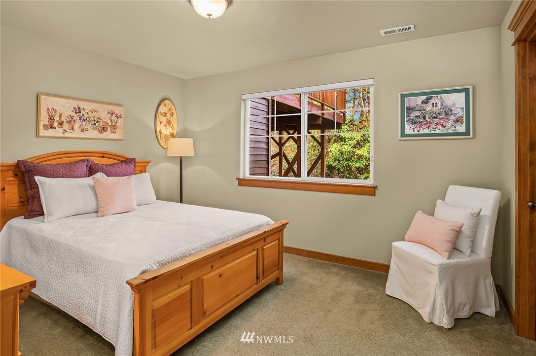 9203 Park Road Edmonds, WA 98020 - Photo 33 of 40 a bedroom with a bed and a couch