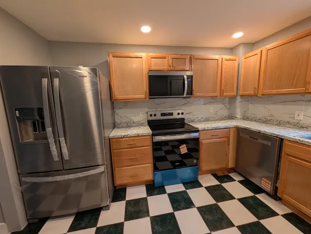 $479,900 | 52 Mammoth Road, Manchester, NH 03109