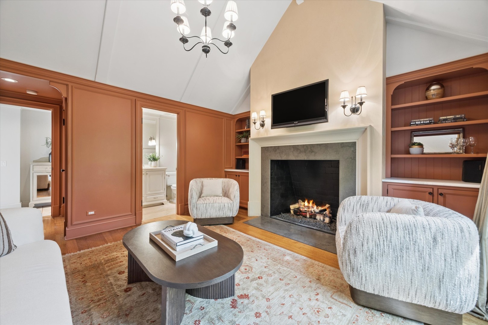 325 Princeton Road Hinsdale, IL 60521 - Photo 22 of 55 a living room with furniture a fireplace and a flat screen tv