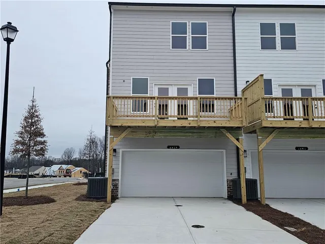 a front view of a house with balcony