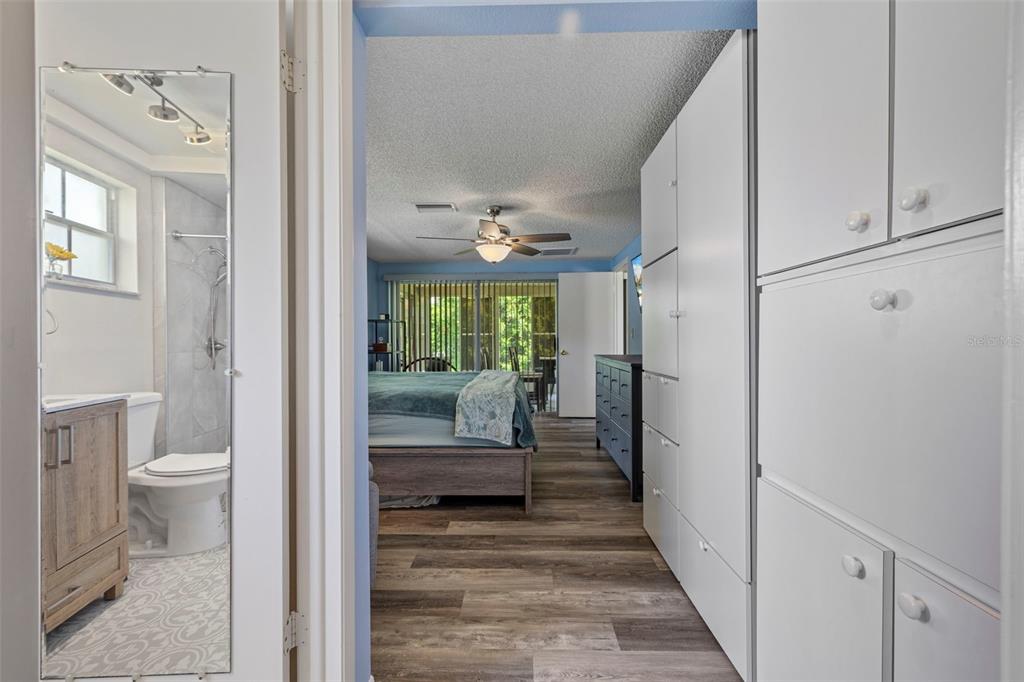 12111 Fieldstone Lane Hudson, FL 34667 - Photo 14 of 49 a bathroom with a toilet a sink and a view of a bathroom