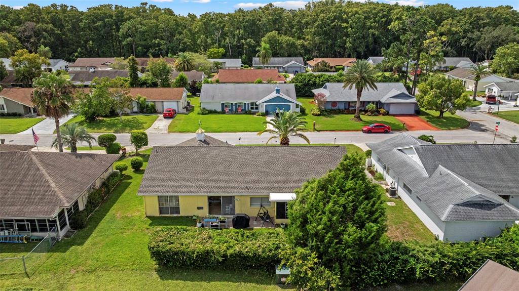 12111 Fieldstone Lane Hudson, FL 34667 - Photo 43 of 49 an aerial view of a house with a garden
