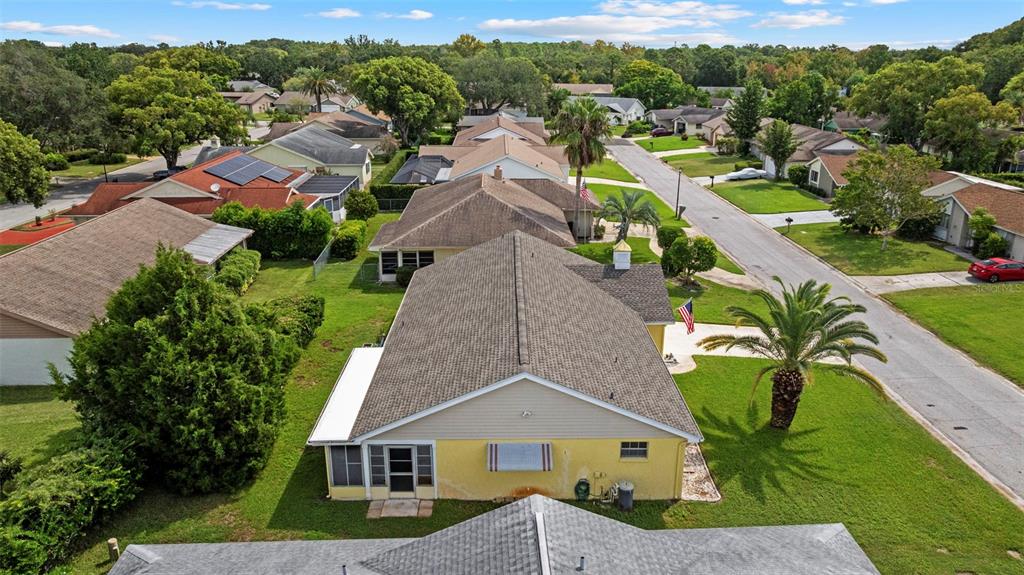 12111 Fieldstone Lane Hudson, FL 34667 - Photo 45 of 49 an aerial view of residential houses with outdoor space and street view