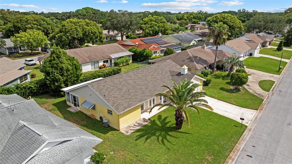 12111 Fieldstone Lane Hudson, FL 34667 - Photo 46 of 49 an aerial view of a house with a garden