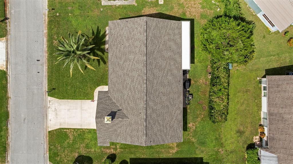 12111 Fieldstone Lane Hudson, FL 34667 - Photo 47 of 49 aerial view of a house with a yard