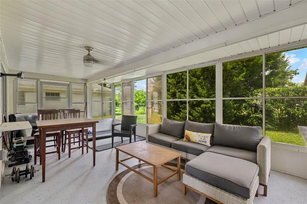 12111 Fieldstone Lane Hudson, FL 34667 - Photo 7 of 49 a living room with furniture and a window