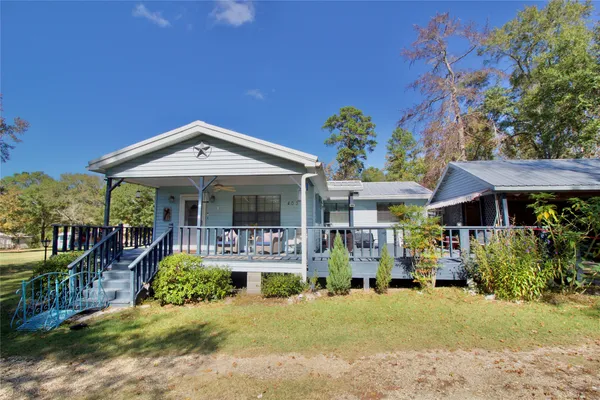 a front view of a house with a porch