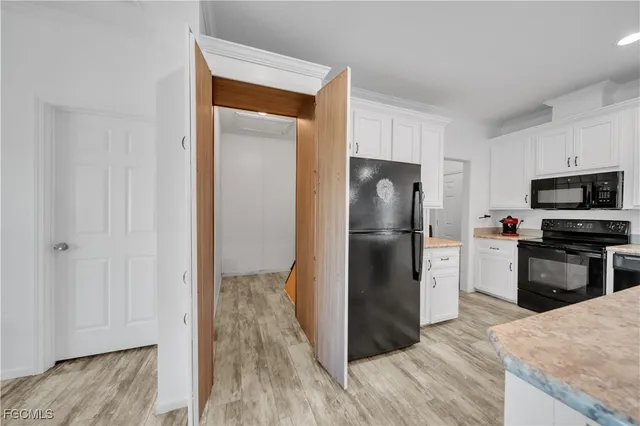 a view of bathroom with washer and dryer