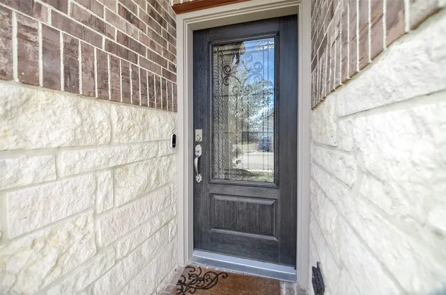 a view of a wooden door with a door