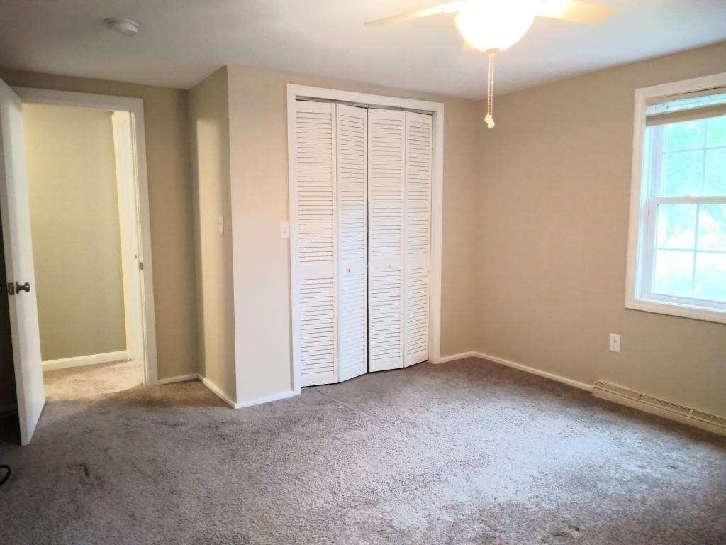 42 Lowell Road Pepperell, MA 01463 - Photo 20 of 32 an empty room with windows