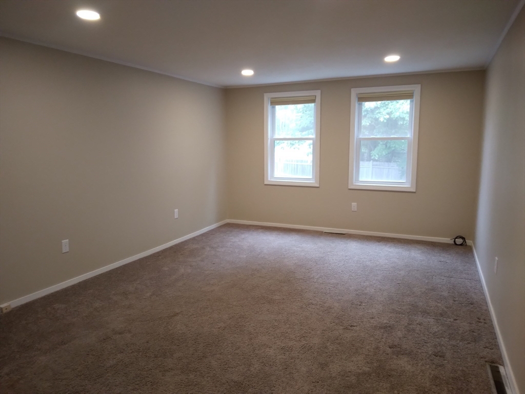42 Lowell Road Pepperell, MA 01463 - Photo 25 of 32 an empty room with windows
