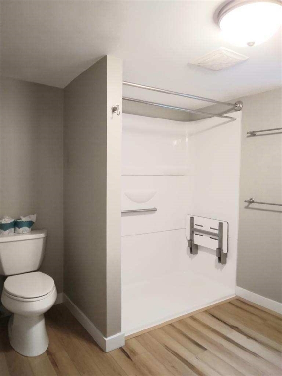 42 Lowell Road Pepperell, MA 01463 - Photo 27 of 32 a bathroom with a toilet and a shower