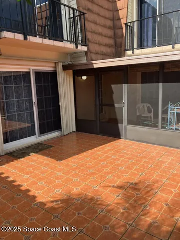 a view of a backyard of the house