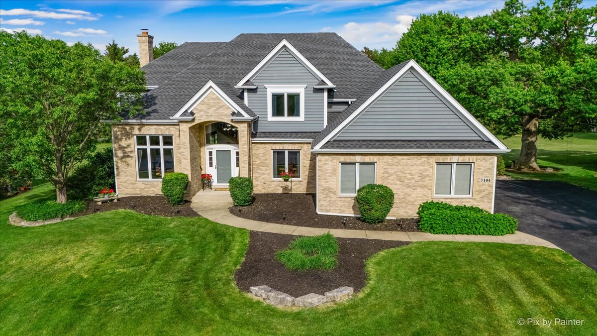 7104 Dove Way Cary, IL 60013 - Photo 72 of 82 front view of a house and a yard
