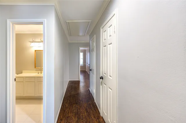 a view of a bedroom from a hallway