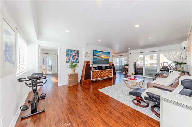 a room with furniture and wooden floor