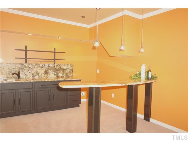 7734 San Gabriel Street Raleigh, NC 27613 - Photo 17 of 25 a bathroom with a sink and a window