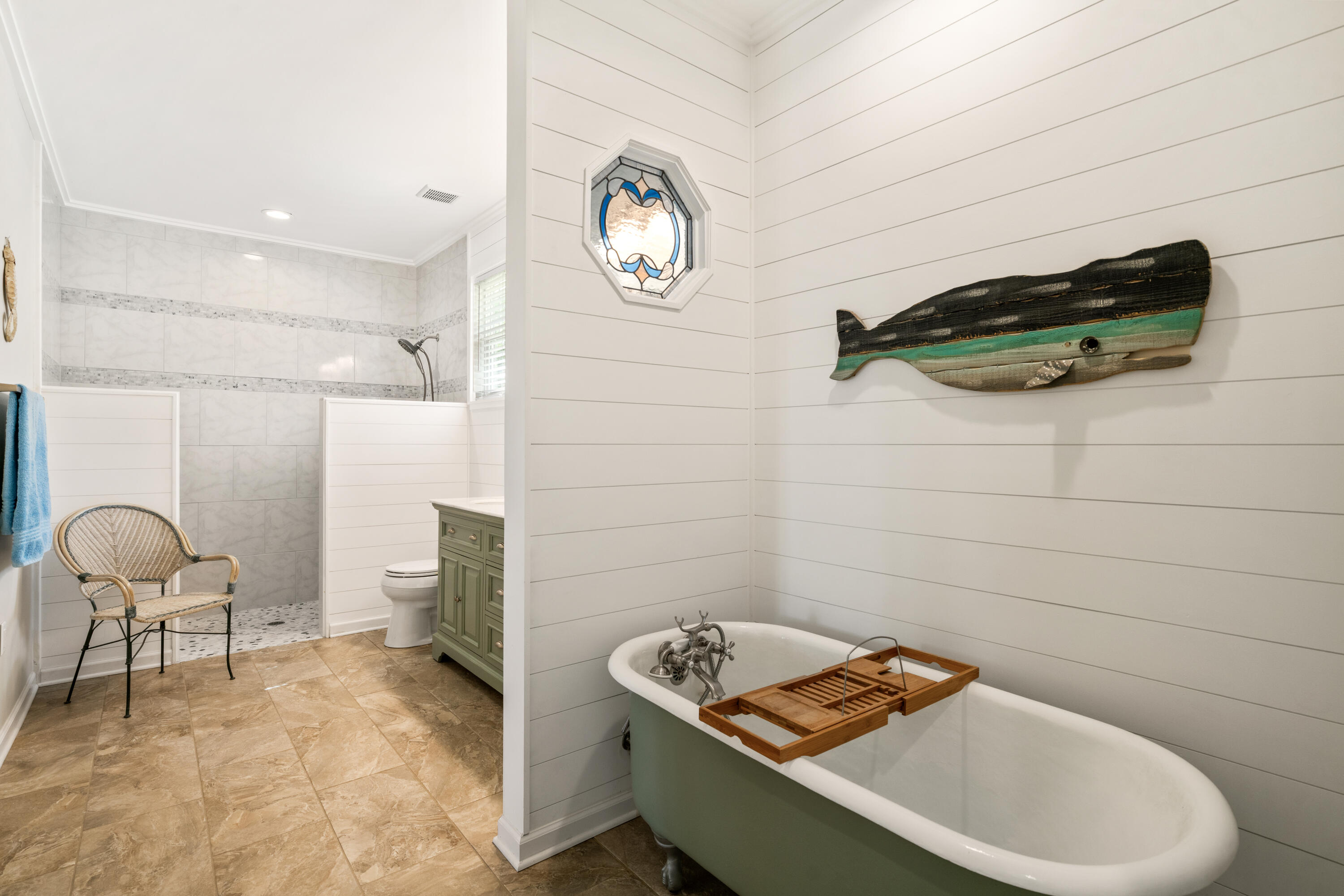 528 Bay Grove Road Freeport, FL 32439 - Photo 19 of 68 a bathroom with a sink a toilet and a shower