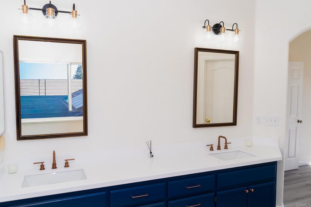 3005 Litt Road Modesto, CA 95355 - Photo 45 of 53 a bathroom with a toilet sink double and mirror