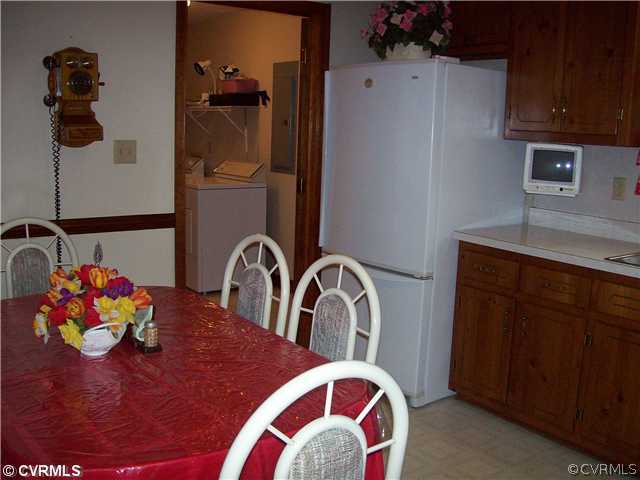 8911 Stagg Run Road Charles City, VA 23030 - Photo 8 of 12 Kitchen - KITCHEN VIEW LEADS TO LAUNDRY ROOM AND F