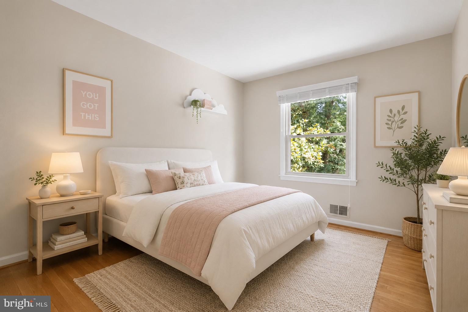 822 Loxford Terrace Silver Spring, MD 20901 - Photo 24 of 61 a bedroom with a bed and a potted plant