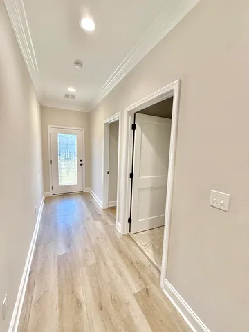 a bathroom with a sink and a washer dryer