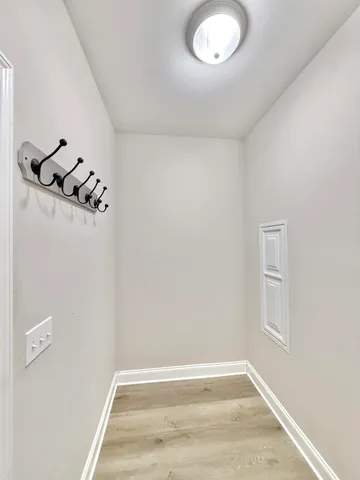a bathroom with a sink and a washing machine