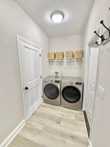 a bedroom with a bed and a mirror