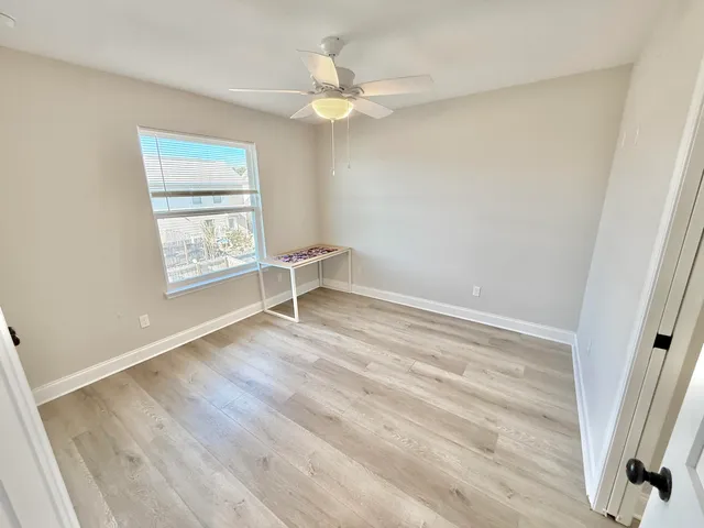a view of bathroom with a shower and a sink