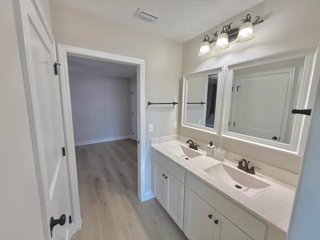a bathroom with a shower and a toilet