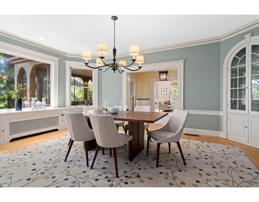 45 The Ledges Road Newton, MA 02459 - Photo 11 of 34 a dining room with furniture a chandelier and wooden floor