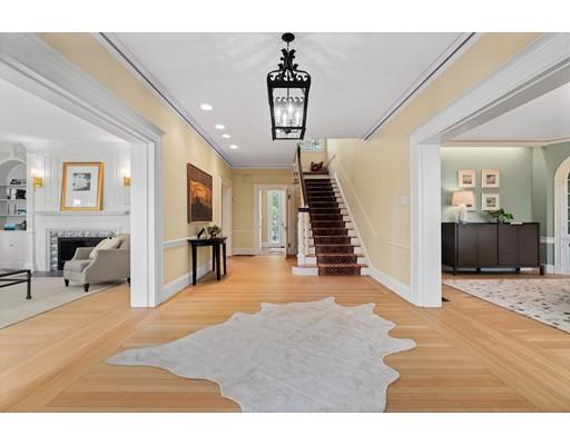 45 The Ledges Road Newton, MA 02459 - Photo 15 of 34 a view of a livingroom with wooden floor and a ceiling fan