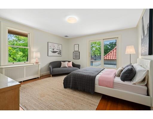 45 The Ledges Road Newton, MA 02459 - Photo 20 of 34 a bedroom with two beds and a large window
