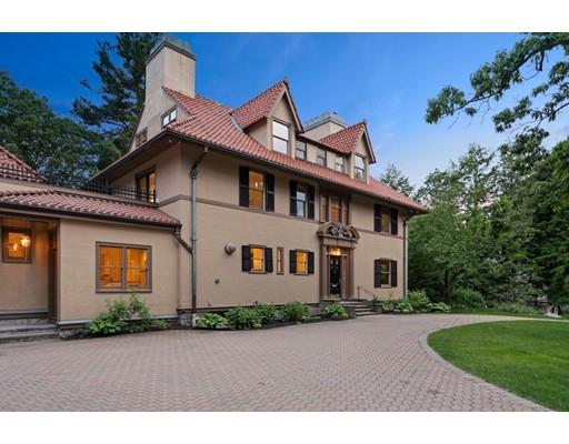 45 The Ledges Road Newton, MA 02459 - Photo 2 of 34 a front view of a house with a yard and garage