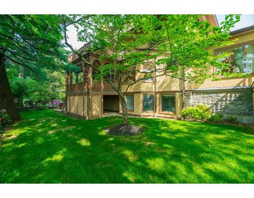 45 The Ledges Road Newton, MA 02459 - Photo 31 of 34 a front view of a house with a garden