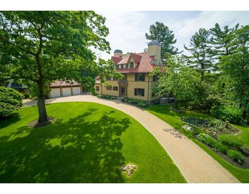 45 The Ledges Road Newton, MA 02459 - Photo 32 of 34 a swimming pool with a garden in the back