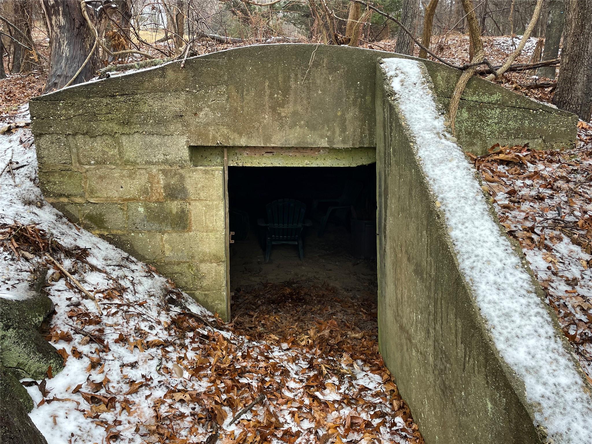 326 A River Road St. James, NY 11780 - Photo 11 of 34 a stone house with a outdoor space