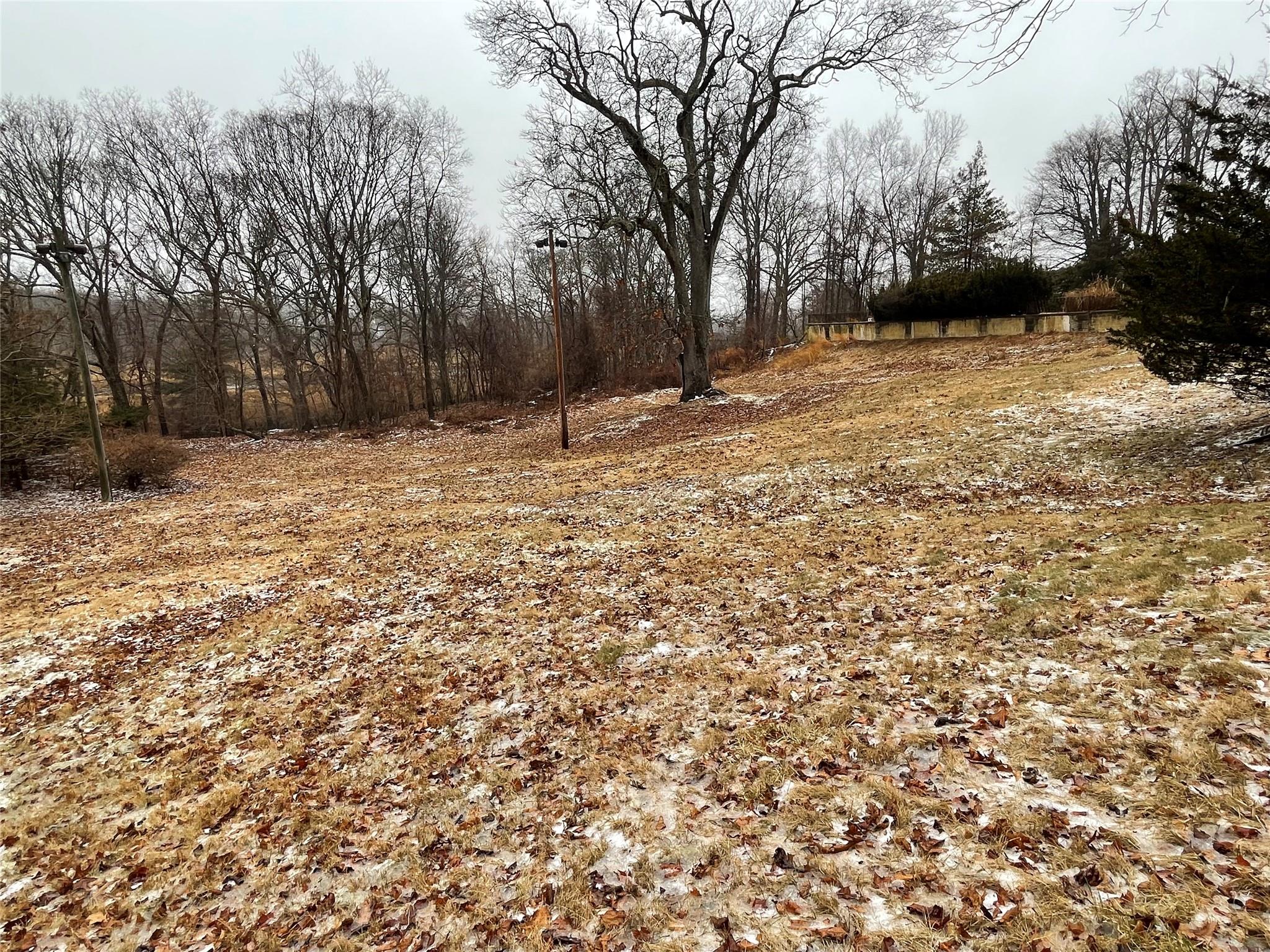 326 A River Road St. James, NY 11780 - Photo 2 of 34 a backyard of a house with trees