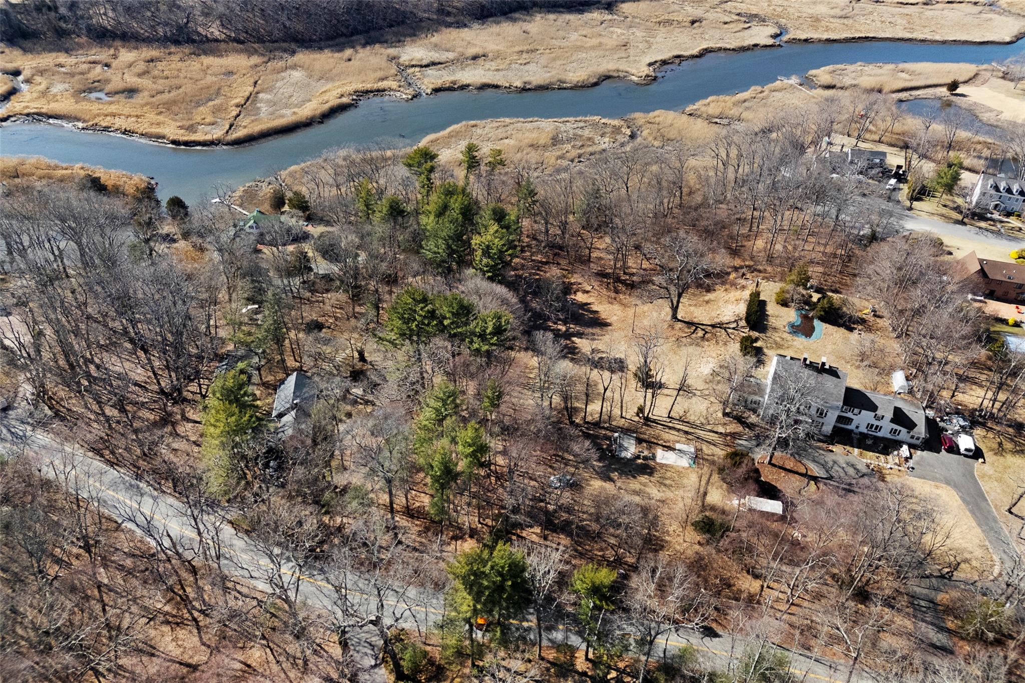 326 A River Road St. James, NY 11780 - Photo 22 of 34 a view of a houses with a yard