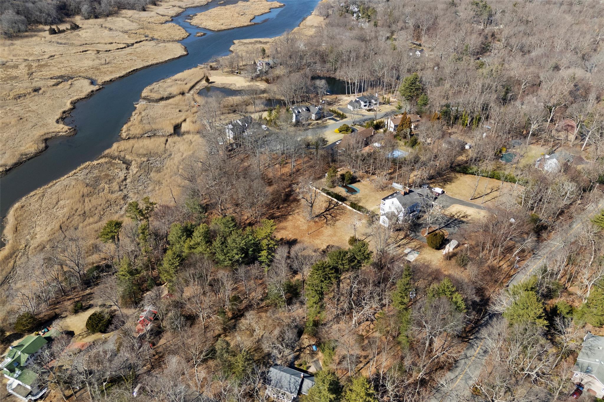 326 A River Road St. James, NY 11780 - Photo 32 of 34 a aerial view of a house with a yard