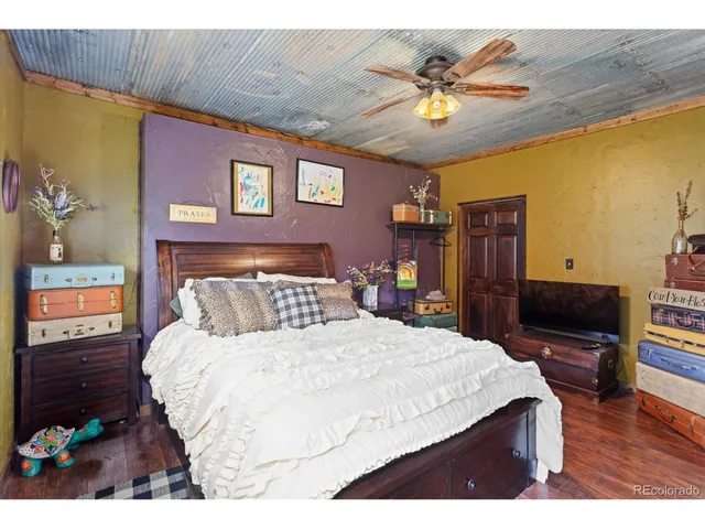 a picture of a room with a white wall and a picture of it