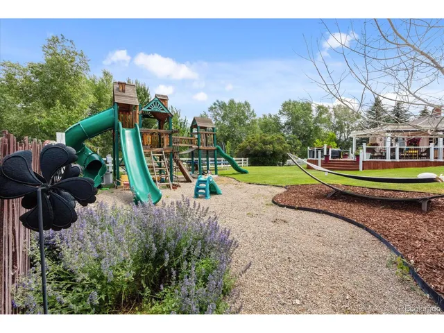 a view of a garden with a slide