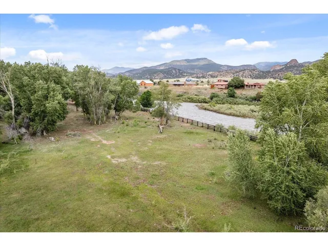 a view of a lake with a mountain